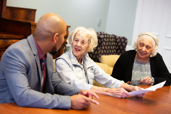 resident speaking with Collington team